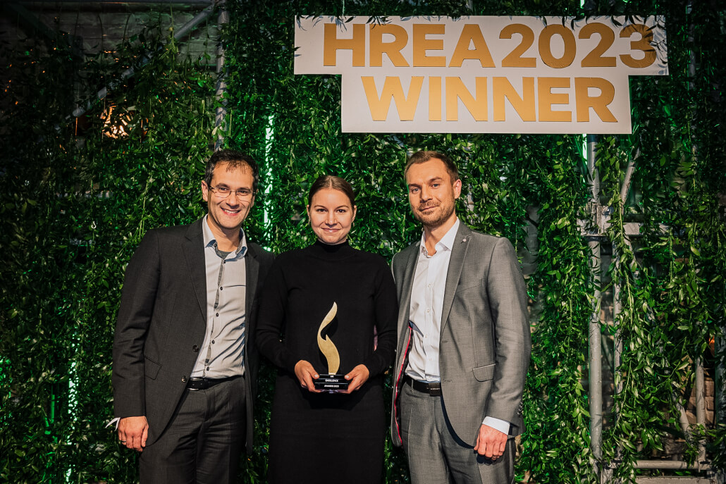 Business Unit Leader Dr. Marcel Graus (on the right), Management Consultant Dr. Vili Dhamo (on the left), and HR Representative Katharina Schäfer (in the middle) at the award ceremony for the HREA 2024.